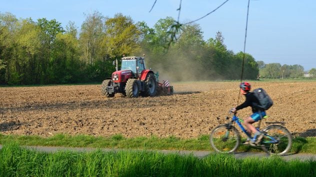 cyclist-tractor-field-safety