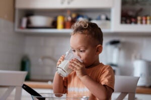 child-drinking-milk-glass